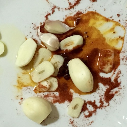 Combination of garlic, paprika in oil, raw ingredients