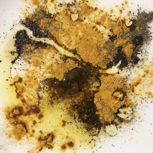 Combination of turmeric, peppre and oil, raw ingredients